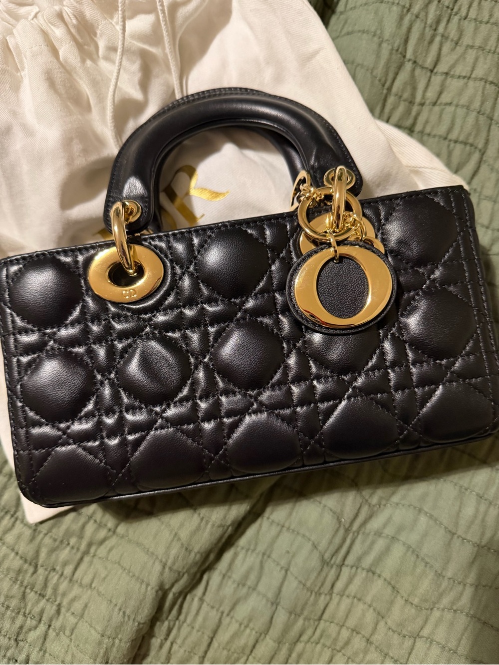 Luxury Black Quilted Leather Top-Handle Bag with Gold Hardware